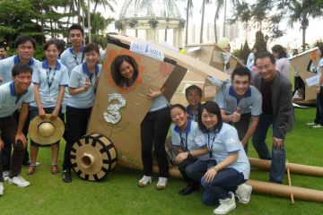 group photo flat out rickshaw rally team building activity