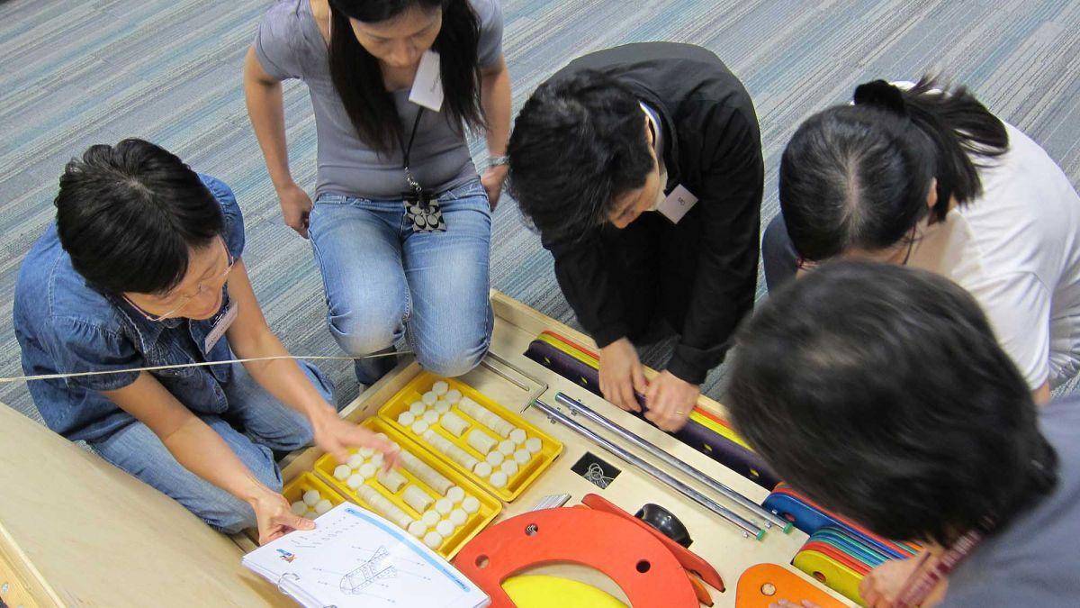 	employees collaborate in strategic team building activity rat