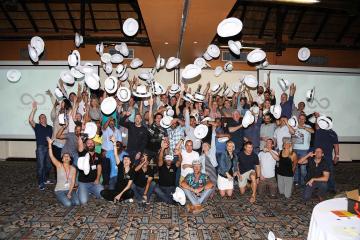 Staff gathering with the Infinite Loop