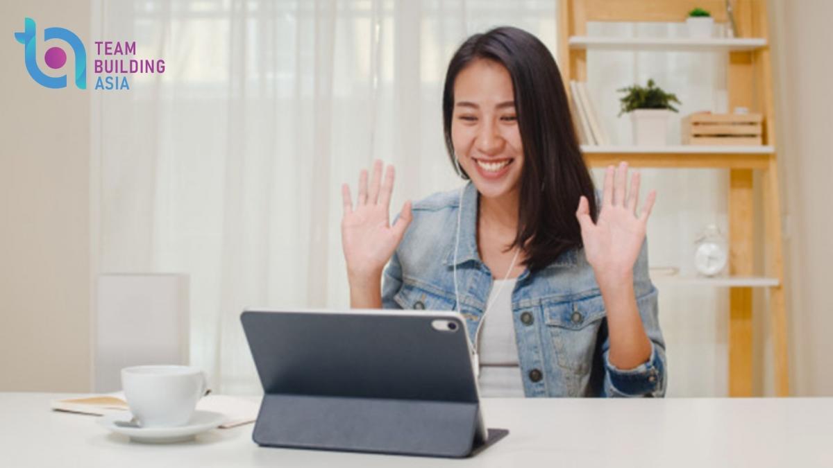girl having fun in online team meeting