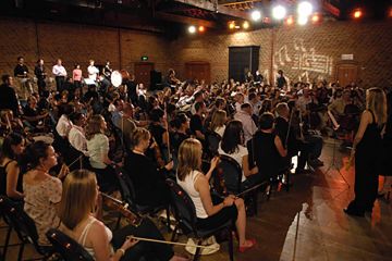 orchestrate music team building activity