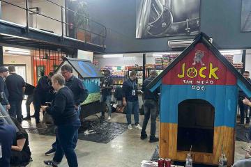 teams build dog kennel