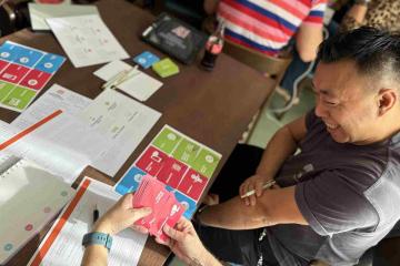 interactive AI team building game