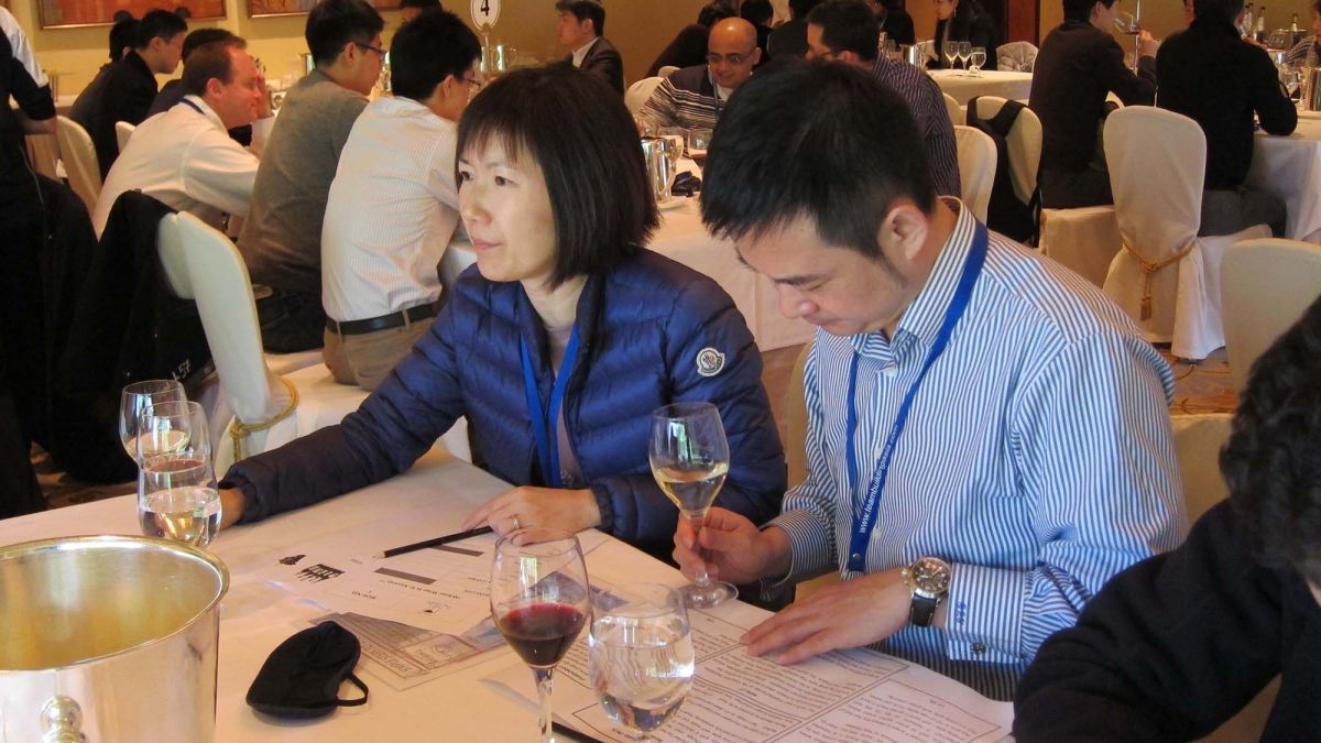 two employees at table during dinner event